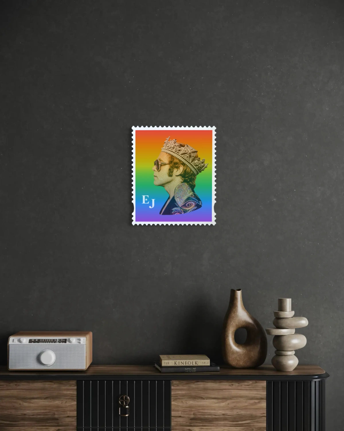 Elton John Rocket King limited edition framed stamp artwork displayed on a charcoal living room wall above a fluted sideboard. #size_medium