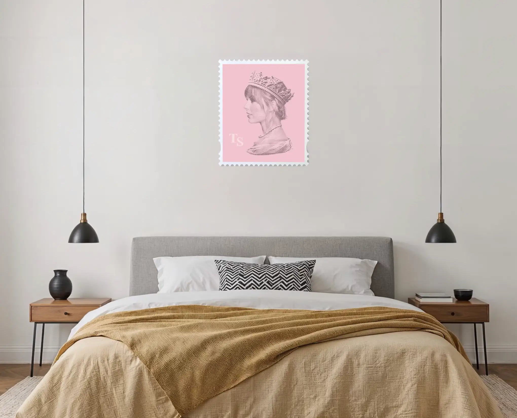 Taylor Swift Long Live the Queen stamp art print displayed above a bed in a contemporary bedroom interior, pink artwork against a neutral wall flanked by two pendant lights and wooden bedside tables. #size_large