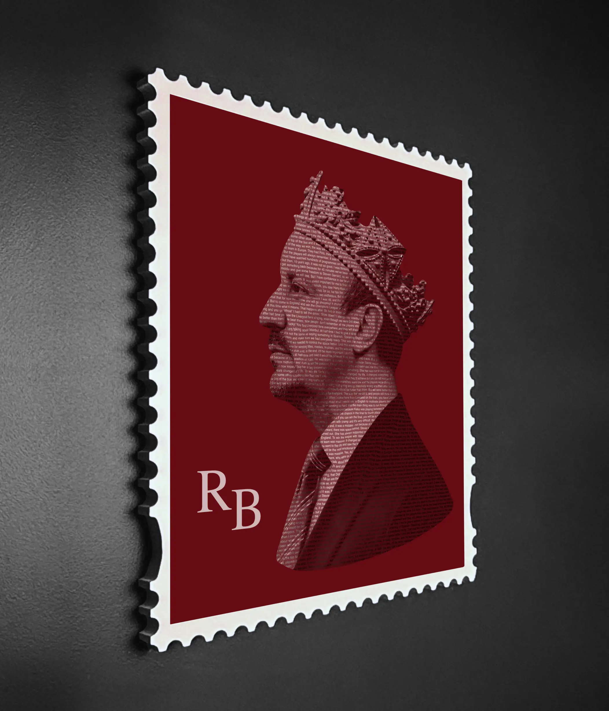 Rafa Benitez quote typography stamp portrait in deep red shown at an angle, revealing the depth and craftsmanship of the handmade wooden stamp frame against a dark background.