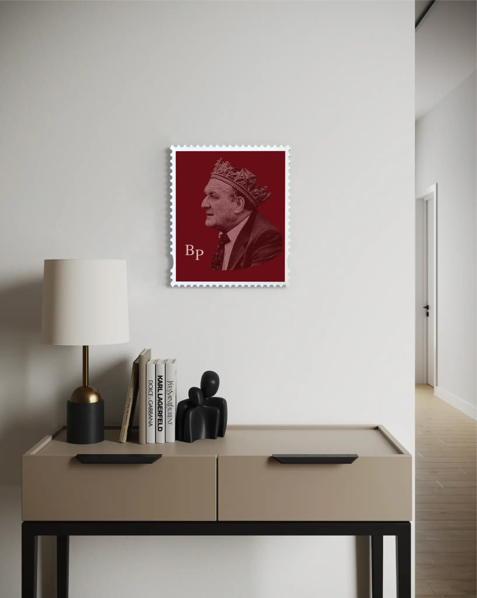 Bob Paisley typography stamp artwork displayed on a white wall above a modern beige console cabinet styled with a table lamp, fashion coffee table books, and a sculptural figurine – showing the piece as refined hallway wall art. #size_medium