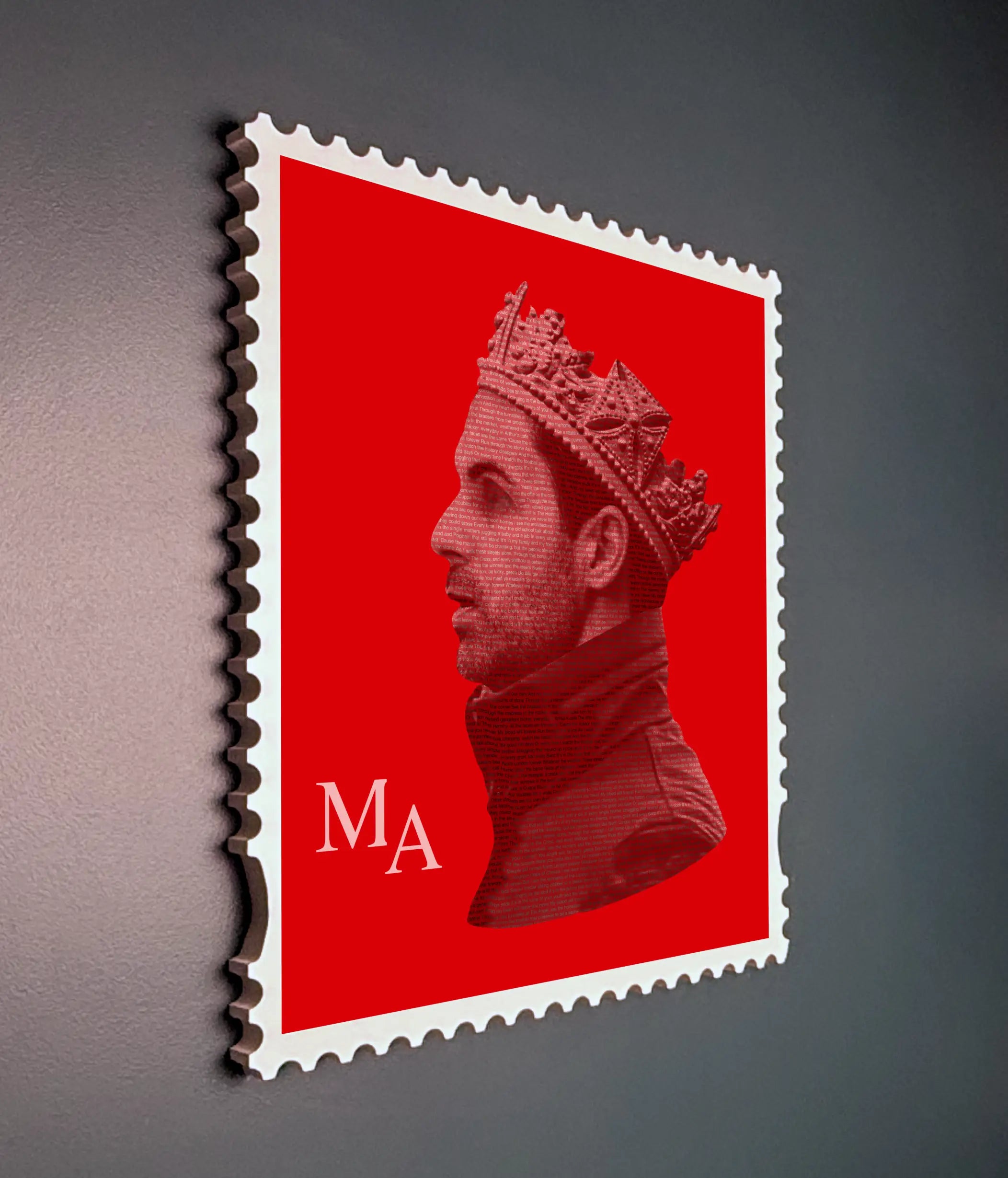 Mikel Arteta limited edition stamp artwork angled side view showing white handmade frame depth and typography detail against a dark grey wall