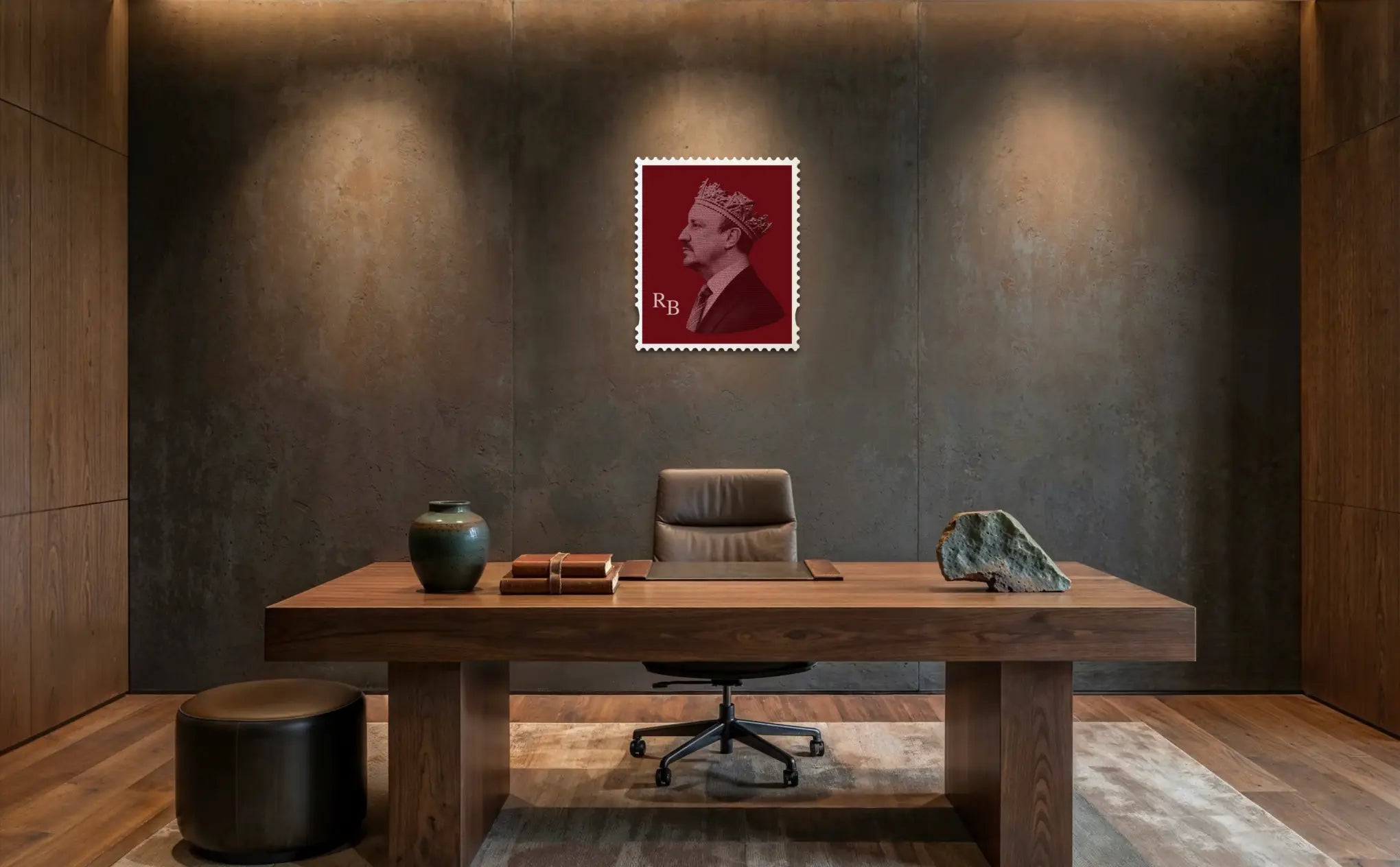 Rafa Benitez quote typography stamp portrait in deep red, displayed on a textured concrete wall above a solid walnut executive desk. #size_large