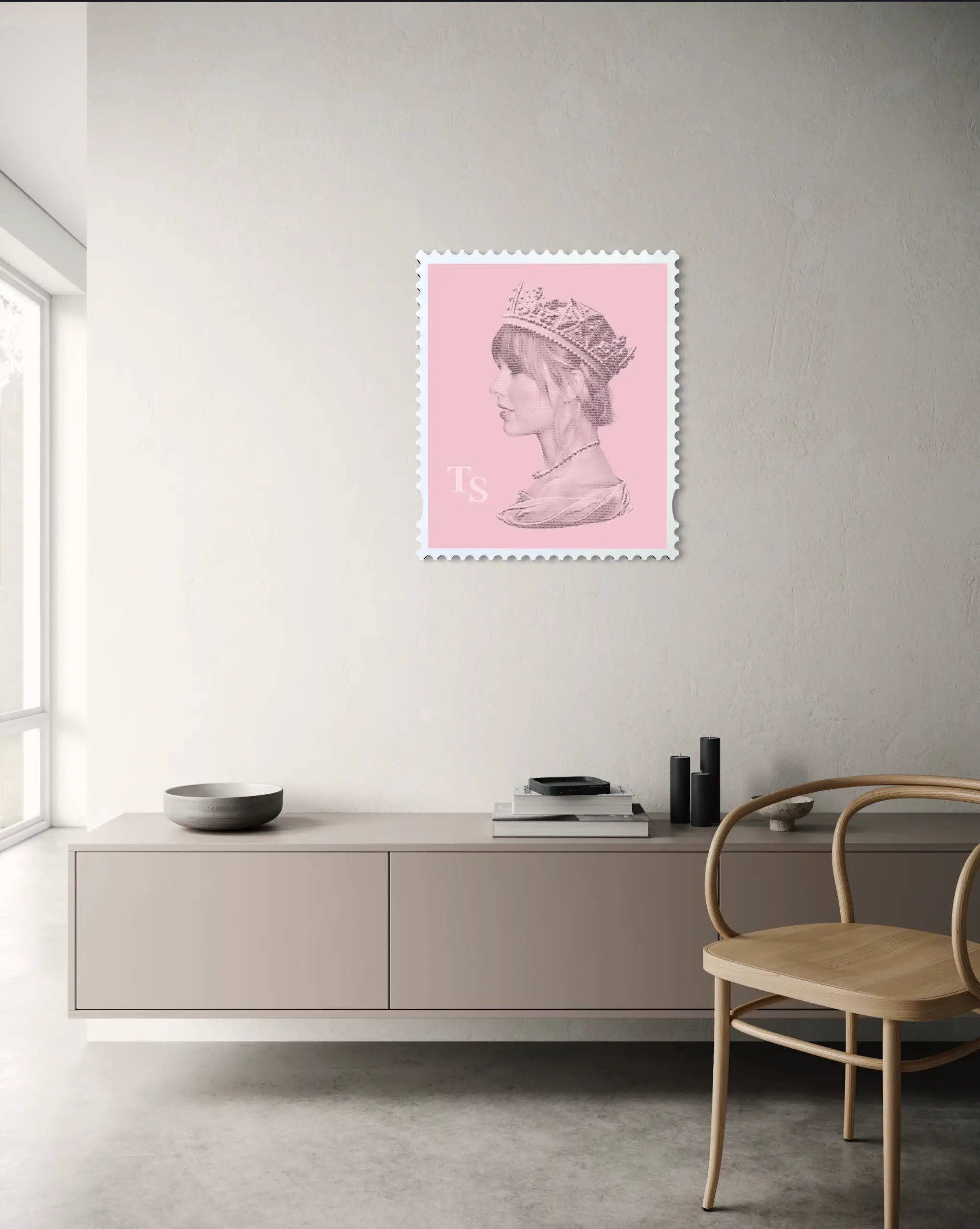 Taylor Swift Long Live the Queen stamp art print displayed above a floating cabinet in a minimalist hallway, pink artwork against a textured neutral wall with natural light from a nearby window. #size_large